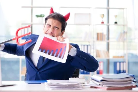 Devil angry businessman in the office 스톡 사진