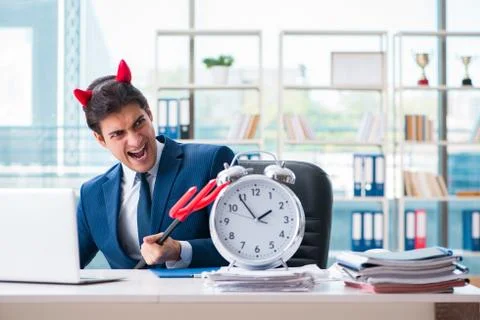 Devil angry businessman in the office Stock Photos