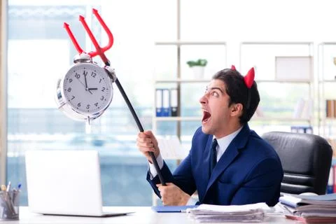 Devil angry businessman in the office Stock Photos