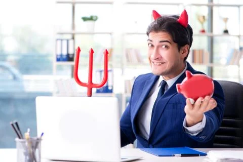 Devil angry businessman in the office Stock Photos