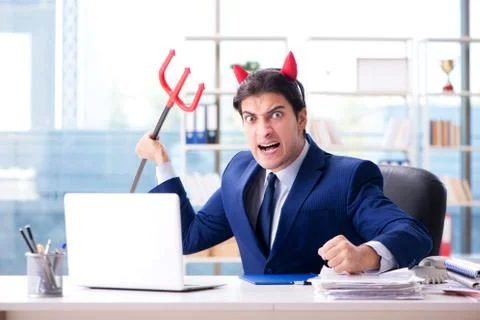 Devil angry businessman in the office Foto stock