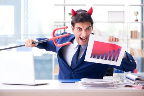 Devil angry businessman in the office Stock Photos