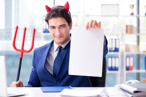 Devil angry businessman in the office 스톡 사진