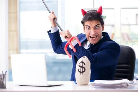 Devil angry businessman in the office Stock Photos