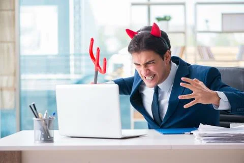Devil angry businessman in the office Foto stock