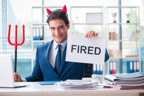 Devil angry businessman in the office Stock Photos