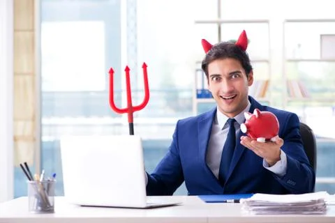 Devil angry businessman in the office Stock Photos