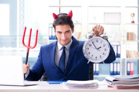 Devil angry businessman in the office Stock Photos