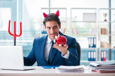 Devil angry businessman in the office Stock Photos