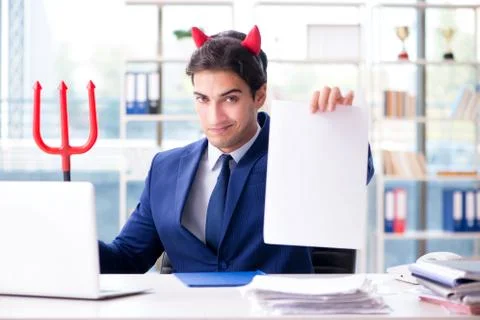 Devil angry businessman in the office Stock Photos