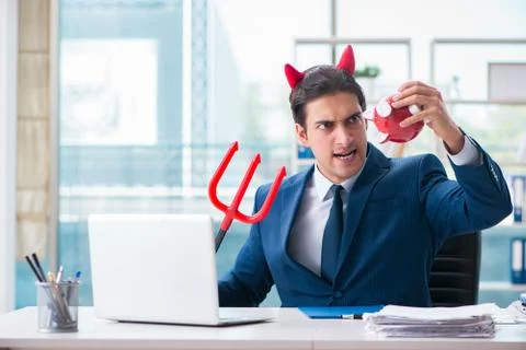 Devil angry businessman in the office Stock Photos