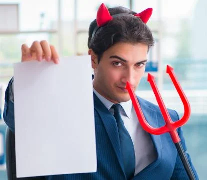 Devil angry businessman in the office Stock Photos