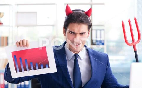 Devil angry businessman in the office Stock Photos