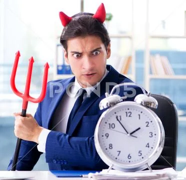 Devil angry businessman in the office Stock Photos