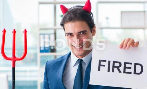 Devil angry businessman in the office Stock Photos