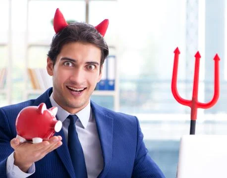 Devil angry businessman in the office Stock Photos