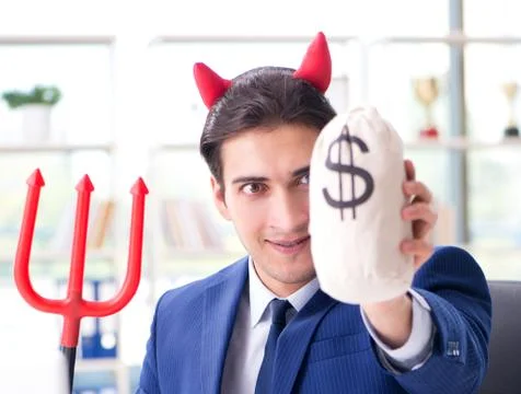 Devil angry businessman in the office Stock Photos