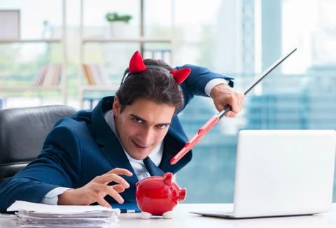 Devil angry businessman in the office Stock Photos