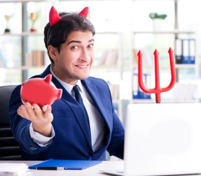 Devil angry businessman in the office Stock Photos