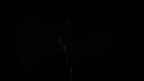 Devil ax for halloween in a dark space with light moving in and out Stock Footage 97388126