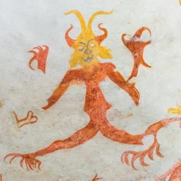 Devil with big claws, a medieval mural 스톡 사진