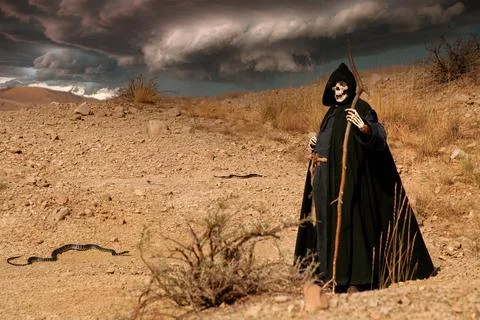 Devil - Death with snakes and dramatic clouds Stock Photos