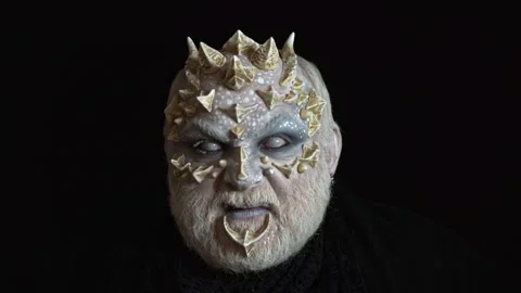Devil demon face on black. Fantasy portrait of a man with artistic horn makeup Stock Footage 320032304