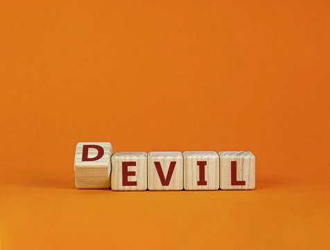 Devil is evil symbol. Turned a cube with words 'Devil is evil'. Beautiful ora 写真素材