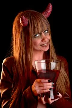 Devil girl in red light 스톡 사진