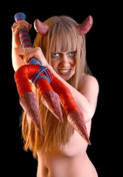 Devil girl with a trident Stock Photos