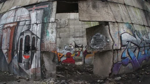 Devil Graffiti On Ruined Concrete Wall In A Warehouse Stock Footage 130899647