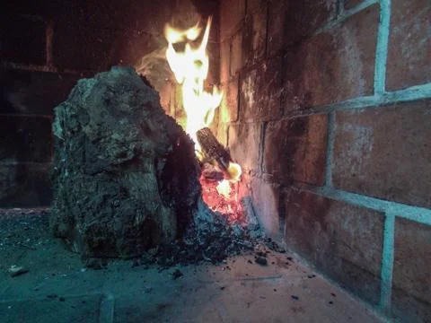 The devil hiding in the flames Stock Photos