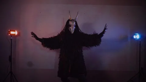 The devil monster dances. man in a scary mask Stock Footage 266927843