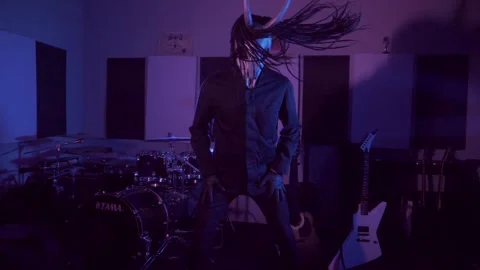 Devil monster suffers, dances, gets angry. A mystical man in a scary mask Stock Footage 250531317