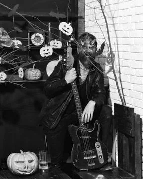 Devil or monster playing instrument. Halloween party concept. Foto stock
