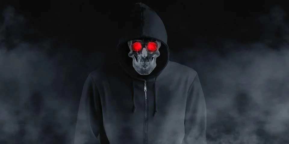 A devil skull in a black robe with a hood and a smoke skull smiling under a b Stockillustratie