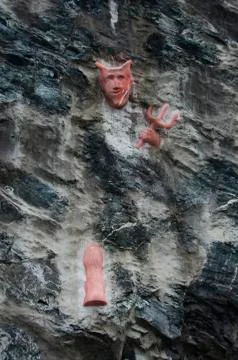 Devil Statue in the Rock Stock Photos