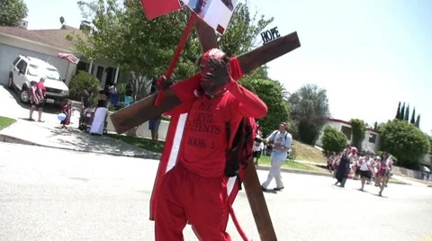 Devil Walks Down Street Stock Footage 7904103