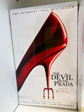 The Devil Wears Prada poster featuring a red high heel by Lauren Weisberger Stock Photos