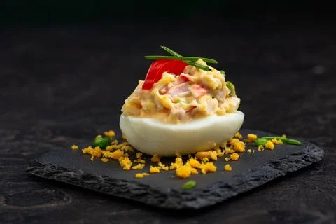 Deviled Egg with Paprika Garnish Stock Photos