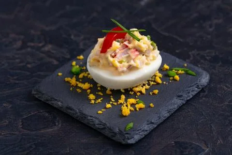 Deviled Egg with Paprika Garnish. Stock Photos