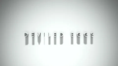 DEVILED EGGS 3D title animation with shadows on a white background 스톡 동영상 296813032