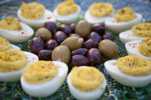Deviled Eggs and Olives before dinner Stock Photos