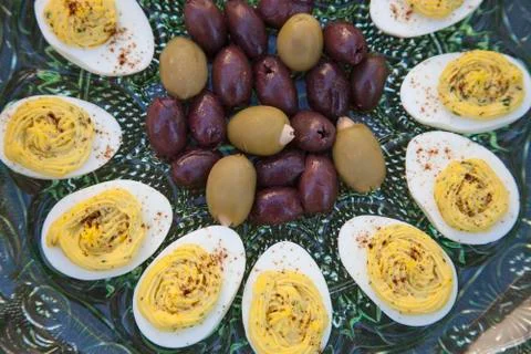 Deviled Eggs and Olives before dinner Stock Photos