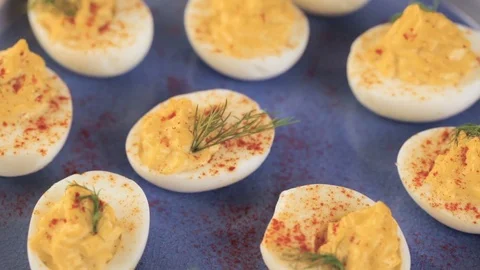 Deviled eggs garnished with fresh dill. Video stock 69725159