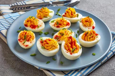 Deviled Eggs on a grey plate with napkin Stock Photos
