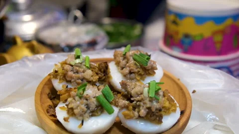 Deviled eggs with mushrooms Decorating deviled eggs with basil. Stock Footage 313991648