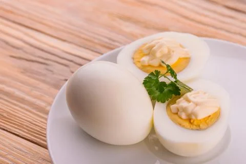 Deviled eggs with parsley in a plate Stock Photos
