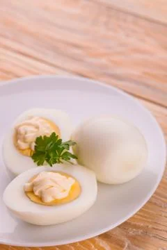 Deviled eggs with parsley in a plate Stock Photos