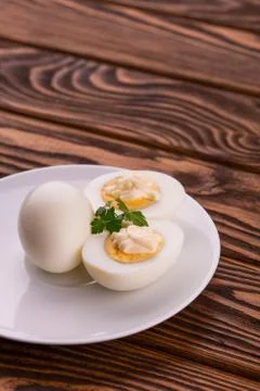 Deviled eggs with parsley in a plate Stock Photos